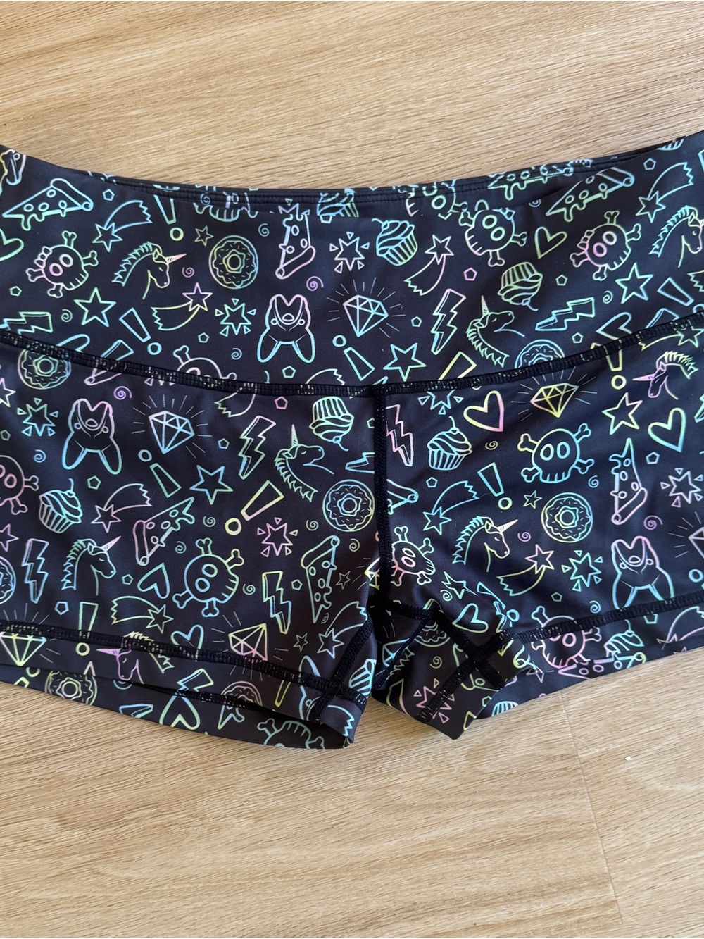 Feed Me Fight Me Black Athletic Shorts with Neon Rainbow Icons